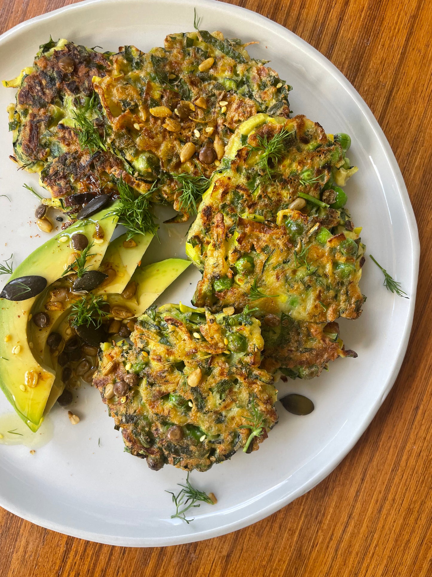 ZUCCHINI, PEA + HERB FRITTERS