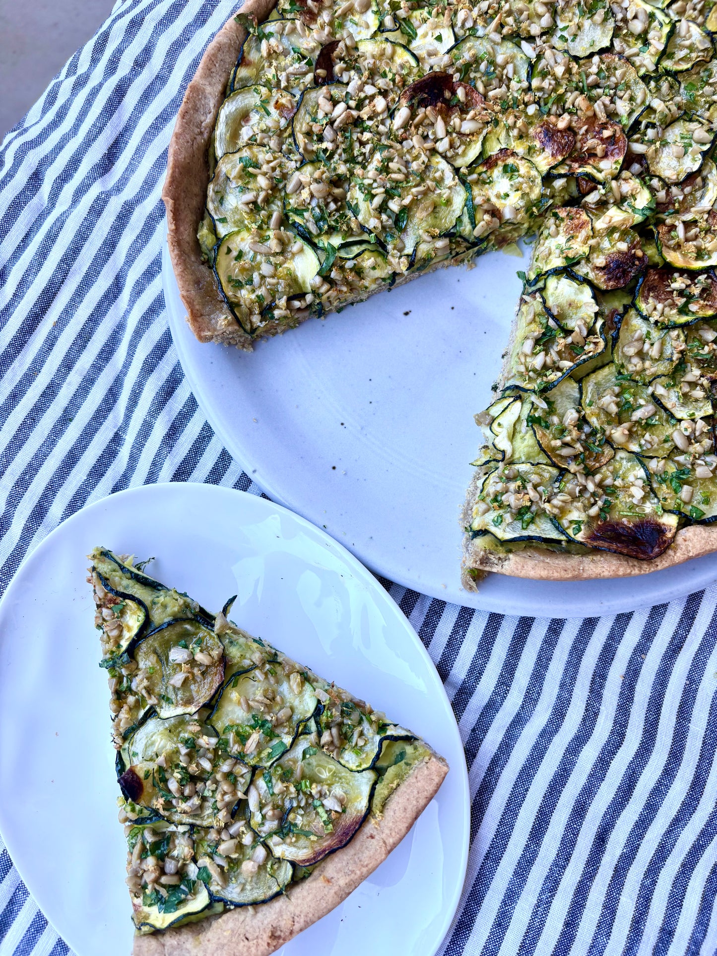ZESTY ZUCCHINI, WHITE BEAN + HERB GRATIN TART