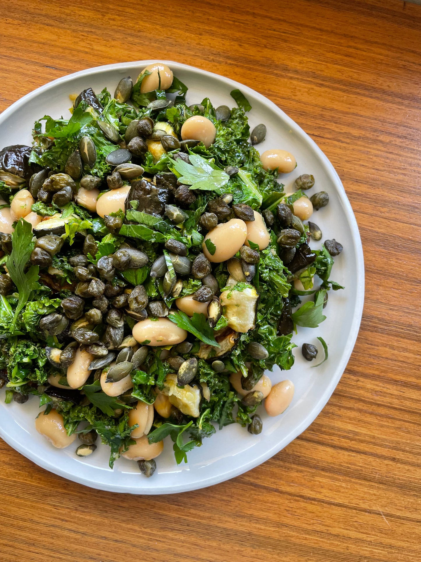 ZESTY ROASTED ZUCCHINI, WHITE BEAN + HERB SALAD WITH CRISPY CAPERS