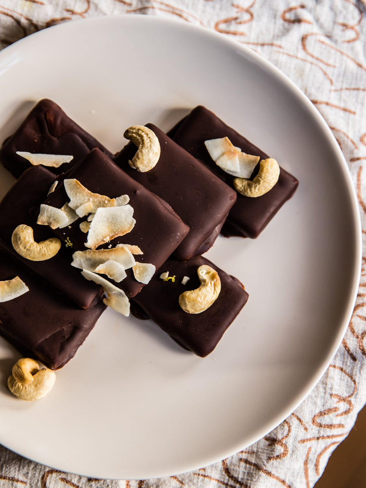 CHEWY CARAMEL, COCONUT + PUMPKIN SEED CHOCOLATE BARS
